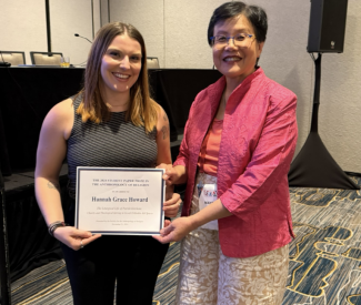 Hannah Grace Howard receives the the 2024 SAR Student Paper Award at the SAR Business Meeting on Nov. 22, 2024 in Tampa, FL