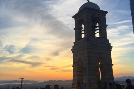 Church bell tower at sunset 